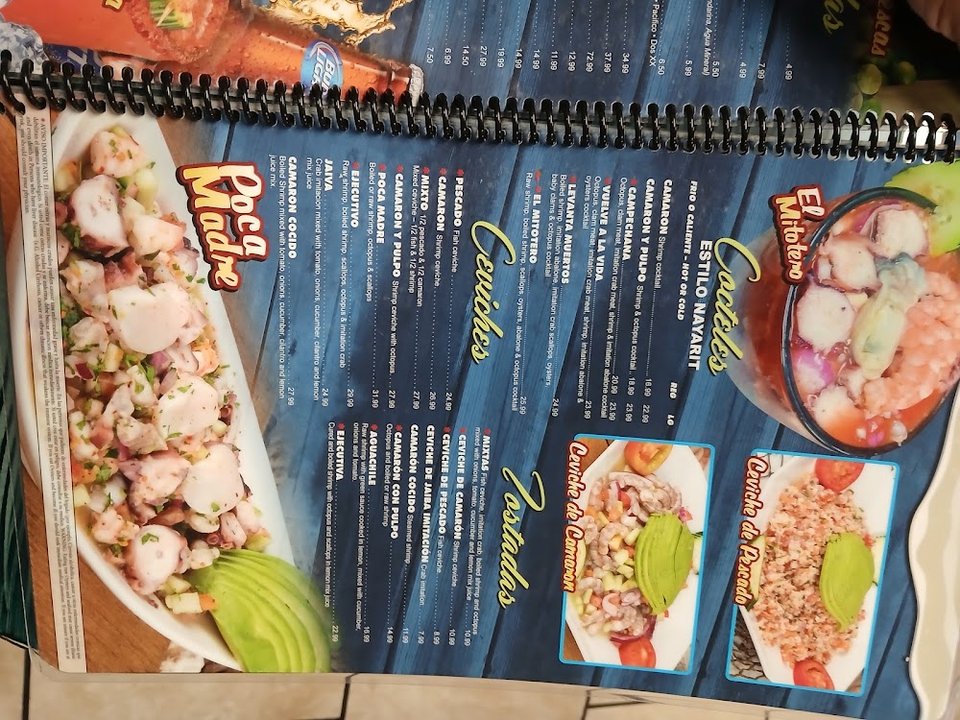 Restaurant menu highlighting mariscos and small plates.